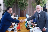El primer ministro vietnamita Pham Minh Chinh (izquida) se réune con el presidente brasileño Luiz Inacio Lula da Silva. (Foto: VNA)