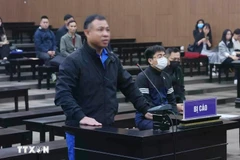 Nghiem Quang Minh, de 46 años, propietario del edificio de nueve pisos. (Fuente: VNA)