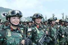 Fuerzas especiales femeninas participan en un entrenamiento conjunto. (Foto: VNA)