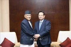 El primer ministro de Vietnam, Pham Minh Chinh, y su homólogo nepalí, Khadga Prasad Sharma Oli. (Fuente: VNA)