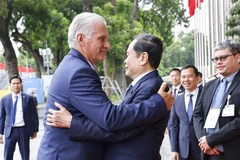 El presidente de la Asamblea Nacional de Vietnam, Tran Thanh Man, y el primer secretario del Comité Central del Partido Comunista de Cuba y presidente de la República, Miguel Díaz-Canel Bermúdez. (Fuente: VNA)