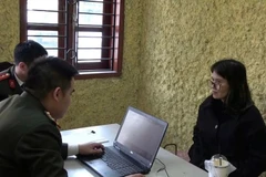 Hoang Thi Hong Thai en la comisaría. (Foto: Policía de Hanoi)