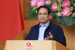 El primer ministro de Vietnam, Pham Minh Chinh, habla en la reunión. (Foto: VNA)