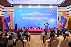 En la reunión. (Foto: VNA)