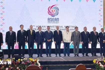 Los delegados posan para una foto. (Foto: VNA)