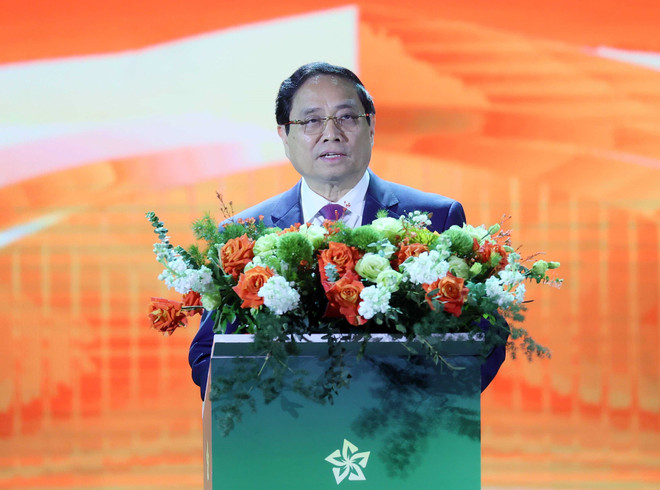 El primer ministro de Vietnam, Pham Minh Chinh, interviene en la cita (Foto: VNA) vna-potal-thu-tuong-du-khai-mac-hoi-cho-mua-thu-lan-thu-nhat-8363490-1.jpg