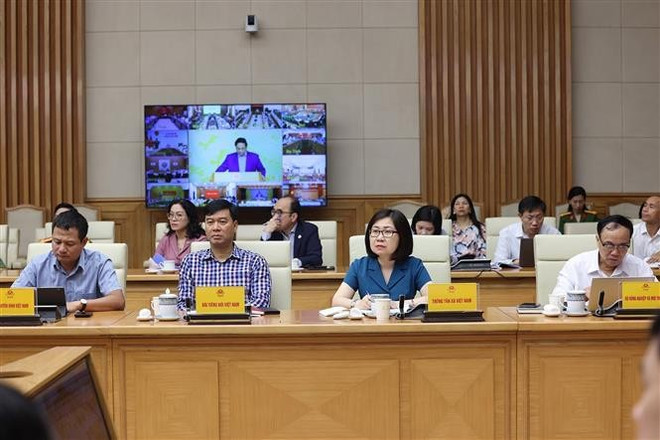 Delegados participantes en la cita (Foto: VNA) vna-potal-thu-tuong-chu-tri-hoi-nghi-trien-khai-chuong-trinh-muc-tieu-quoc-gia-phong-chong-ma-tuy-den-nam-2030-8326527.jpg
