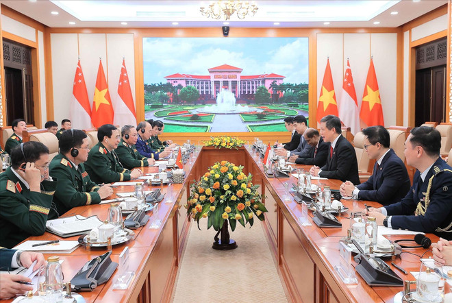 Panorama de la reunión (Foto: VNA) vna-potal-bo-truong-quoc-phong-singapore-tham-chinh-thuc-viet-nam-816332222-10-20-45.jpg