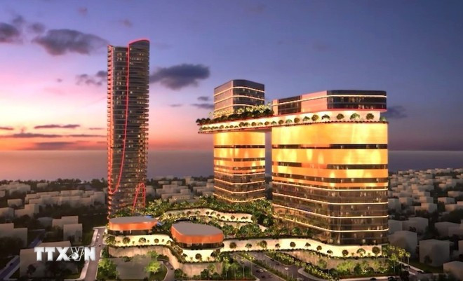 Un modelo de centro de negocios asociado con el símbolo financiero de la ciudad de Da Nang. (Foto: VNA) da-nang.jpg