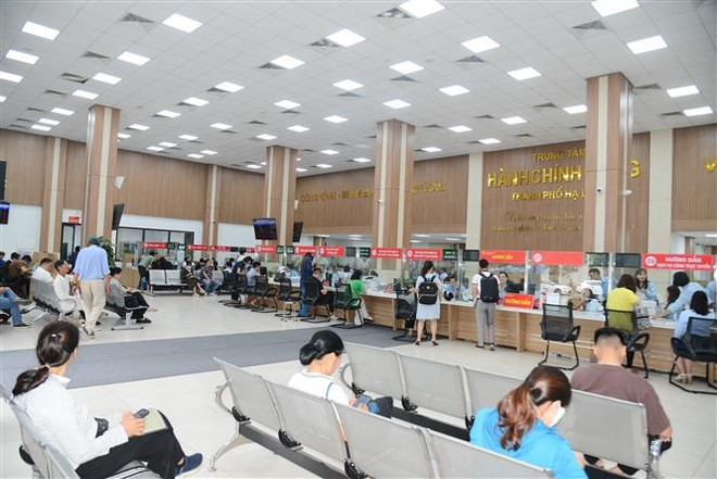 El primer día de operación del modelo de administración de dos niveles transcurre de manera fluida (Foto: VNA) vna-potal-phuong-xa-dac-khu-tai-quang-ninh-trong-ngay-dau-thu-nghiem-van-hanh-chinh-quyen-dia-phuong-hai-cap-8095473.jpg