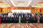 El presidente Luong Cuong, su esposa y los delegados asisten al acto conmemorativo. (Fuente: VNA)