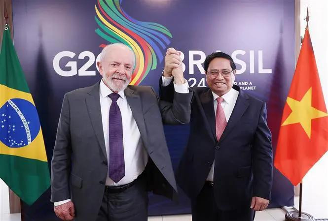 El primer ministro de Vietnam, Pham Minh Chinh, y el presidente de Brasil, Luiz Inácio Lula da Silva. (Fuente: VNA)