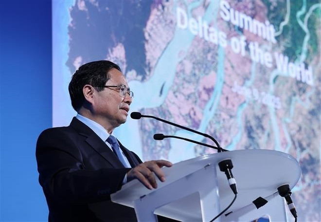 El primer ministro de Vietnam, Pham Minh Chinh, interviene en la cita (Foto: VNA) vna-potal-thu-tuong-pham-minh-chinh-phat-bieu-tai-su-kien-ve-dong-bang-chau-tho-the-gioi-8082011.jpg