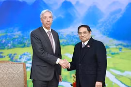 El primer ministro Pham Minh Chinh (dcha.) y el ministro portugués de Relaciones Exteriores, Joao Gomes Cravinho (Foto: VNA)