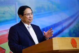 El primer ministro Pham Minh Chinh interviene en la conferencia. (Fuente: VNA)