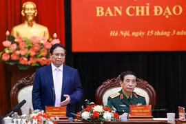 El primer ministro Pham Minh Chinh interviene en la reunión. (Fuente: VNA)