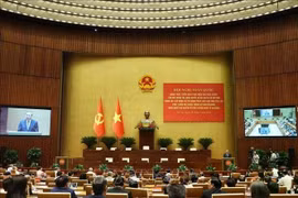 El secretario general del Partido Comunista de Vietnam, To Lam, se dirige a la conferencia nacional para difundir e implementar las Resoluciones 66-NQ/TW y 68-NQ/TW del Buró Político. (Foto: VNA)