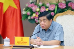 El viceprimer ministro de Vietnam Nguyen Chi Dung interviene en la reunión (Foto: VGP)