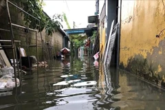 Inundaci´´on en una calle en la ciudad de Hue (Foto: VNA)