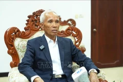 El jefe de la Comisión de Propaganda y Educación del Comité Central del Partido Popular Revolucionario de Laos, Khamphanh Pheuyavong (Foto: VNA)