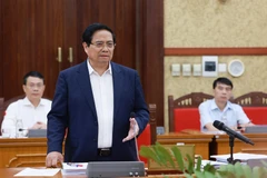 El primer ministro de Vietnam, Pham Minh Chinh, preside la cita (Foto: VNA)