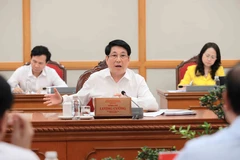 El miembro del Buró Político y presidente de Vietnam, Luong Cuong, dirige la reunión (Foto: VNA)