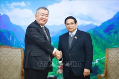 El primer ministro de Vietnam, Pham Minh Chinh (derecha), recibe al director ejecutivo y presidente de Yamato Holdings, Nagao Yutaka (Foto: VNA)