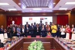 Delegados participantes en la ceremonia de clausura (Foto: VNA)