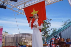 Representante de Vietnam con el traje tradicional Ao Dai en World EXPO 2025, en Osaka. (Foto: Vietnam+)