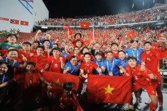Los jugadores Sub-22 de Vietnam celebran su victoria. (Foto: VNA)
