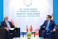 El primer ministro de Vietnam, Pham Minh Chinh (derecha), dialoga con su homólogo de Timor Leste, Xanana Gusmão (Foto: VNA)
