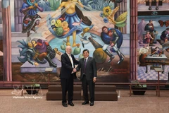 El viceministro vietnamita de Agricultura y Medio Ambiente Tran Thanh Nam se reúne con el titular de la Secretaría de Agricultura y Desarrollo Rural de México, Julio Berdegué Sacristán (Foto: VNA)