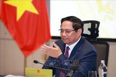El primer ministro de Vietnam, Pham Minh Chinh, preside la cita (Foto: VNA)