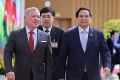 El primer ministro de Vietnam, Pham Minh Chinh (derecha), y el Rey de Jordania, Abdullah II Ibn Al-Hussein (Foto: VNA)