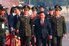 El miembro del Buró Político y miembro permanente del Secretariado del Comité Central del PCV, Tran Cam Tu, asiste a la ceremonia de despliegue de agentes como parte del ensayo de los planes de seguridad para el XIV Congreso Nacional del Partido (Foto: VNA)