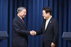 El secretario general del Partido Comunista de Vietnam, To Lam (izquierda), y el presidente de Corea del Sur, Lee Jae Myung (Foto: VNA)