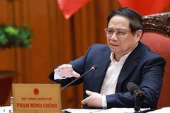El primer ministro de Vietnam, Pham Minh Chinh, preside la reunión (Foto: VNA)