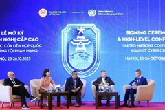 Delegados debaten en la cita (Foto: VNA)