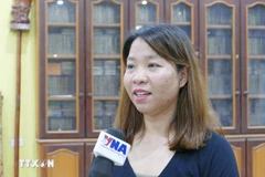 Nguyen Thi Thu Huyen, jefa de la Oficina de la Asociación de Vietnamitas en Vientián (Foto: VNA)