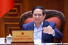 El primer ministro de Vietnam, Pham Minh Chinh, preside la reunión (Foto: VNA)