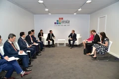 En la reunión entre el viceprimer ministro vietnamita Ho Duc Phoc y el ministro de Comercio Exterior y Cooperación al Desarrollo de Finlandia, Ville Tavio (Fuente: VNA)