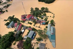 Una zona residencial gravemente inundada en la comuna de Yen Binh, provincia de Lang Son (Foto: VNA)