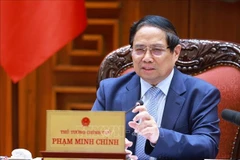 El primer ministro de Vietnam, Pham Minh Chinh, preside la reunión (Foto: VNA)