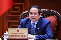 El primer ministro de Vietnam, Pham Minh Chinh, interviene en la reunión (Foto: VNA)