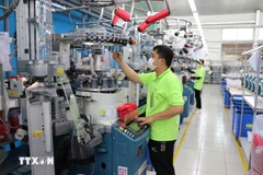 En la fábrica Sung Hwa Vina (de capital surcoreano) en el Parque Industrial Hoa Binh, en la provincia vietnamita de Tay Ninh (Foto: VNA)