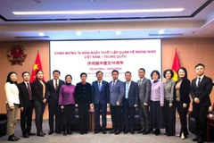 Un acto se celebró en Chongqing para conmemorar el 76.º aniversario del establecimiento de los vínculos diplomáticos entre Vietnam y China (18 de enero) (Foto: VNA)