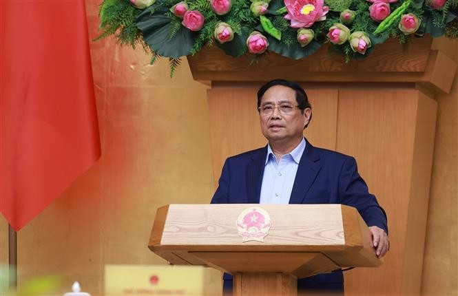 El primer ministro de Vietnam, Pham Minh Chinh, interviene en la reunión. (Fuente: VNA)