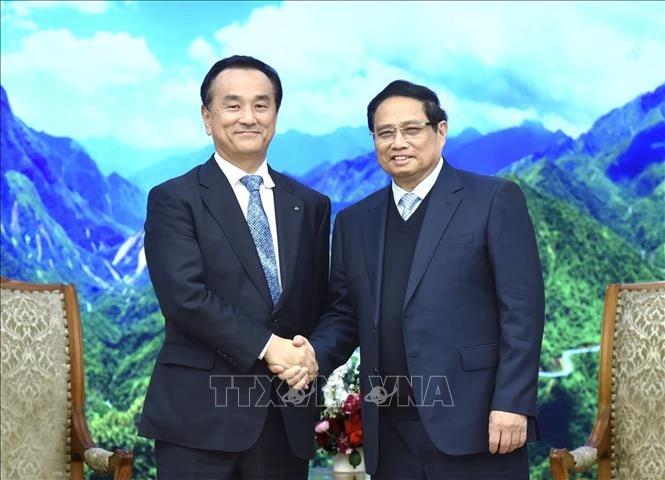 El primer ministro de Vietnam, Pham Minh Chinh, recibe a Muraoka Tsugumasa, gobernador de la prefectura japonesa de Yamaguchi (Foto: VNA)