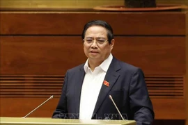 El primer ministro Pham Minh Chinh habla en la conferencia. (Foto: VNA)