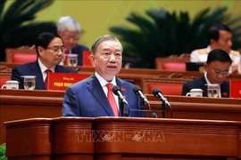 El secretario general del Partido Comunista de Vietnam, To Lam, presenta el Informe en el Congreso. Foto: VNA)